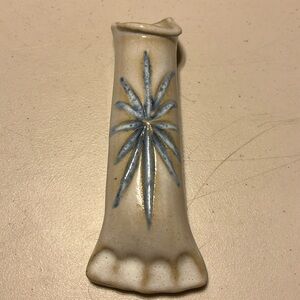 Vintage wall pocket signed. Beautiful flower. Well made pottery